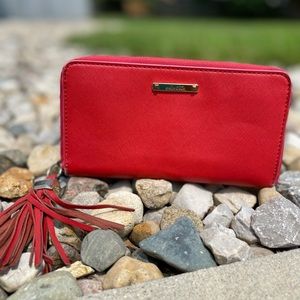 STELLA & DOT red leather tassel wallet zip around